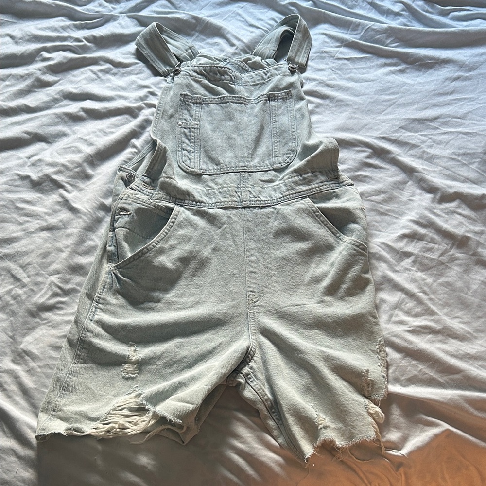 Women’s Distressed light Denim cut off Overalls